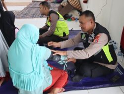 Sentuhan Kemanusiaan Polri, Layanan Kesehatan Pusdokkes Jangkau Warga Hingga Pelosok Aceh Terdampak Bencana